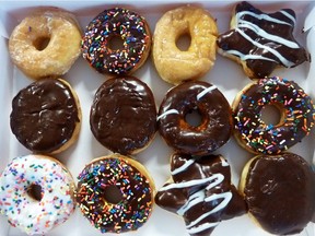 US-FOOD-DOUGHNUT

An assortment of ring doughnuts and filled doughnuts, glazed doughnuts and powdered doughnuts is seen in a paper box in Washington, DC June 5, 2015. The first Friday in June is "National Donut Day" in the United States. AFP PHOTO Eva HAMBACHEVA HAMBACH/AFP/Getty Images
EVA HAMBACH, AFP/Getty Images