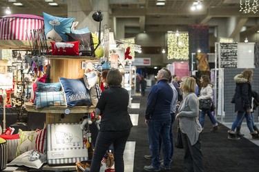 Salon-goers browse handmade goods.