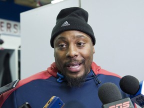 Montreal Alouettes player Nik Lewis speaks to reporters as the team cleans out their lockers in Montreal, Saturday, November 4, 2017.