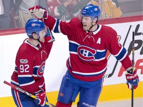 Canadiens defenceman Shea Weber (right) celebrates with teammate Jonathan Drouin after scoring goal against the Florida Panthers during NHL game at the Bell Centre on Oct. 24, 2017.