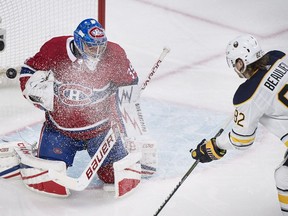Canadiens goalie Charlie Lindgren makes a save against Buffalo Sabres' Nathan Beaulieu during second-period action in Montreal on Saturday, Nov. 11, 2017.