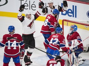 The Arizona Coyotes' Christian Fischer celebrates after scoring against the Montreal Canadiens during the third period of Thursday's 5-4 win in Montreal.