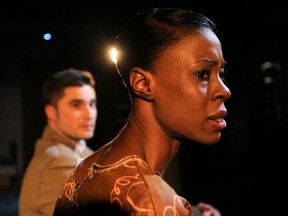 Helen Koya as Odette Uwera and Olivier Lamarche as Reid Cooper perform a scene from State of Denial by Rahul Varma at the McCord museum in Montreal Thursday, March 15. Varma says culturally diverse companies receive only a fraction of the public arts funding that established majority-community companies get.