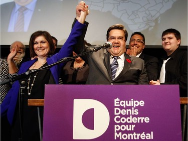 Denis Coderre of Équipe Denis Coderre celebrates his victory Sunday, November 3, 2013 in Montreal with his wife Chantale Renaud after being voted in as the new mayor of Montreal in the Montreal Municipal election. On the right is his son Alexandre.