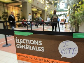 The next Quebec election is set for 2018. Here, in 2014, voters queue at Concordia University in Montreal. (John Mahoney  / THE GAZETTE)