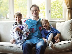Baseball writer Jonah Keri at home with his children Ellis and Thalia.