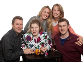 Elisabeth Linton, top right, and her husband, Randall, bottom left, will be at Ste-Justine Hospital Wednesday to inaugurate a research laboratory named after their daughter Elisa, centre. The lab will be dedicated to research on Sanfilippo syndrome, the rare childhood disease that Elisa suffered from. Also in this family portrait: her siblings Jessica, top left, and Connor.
