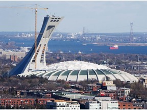 The Olympic Stadium is seen Friday, Nov. 10, 2017, in Montreal. The Quebec government has given the go-ahead to replace the failing roof at an estimated cost of between $200 million and $250 million.