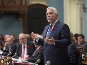 In October 2017, Quebec Premier Philippe Couillard responds to Opposition questions over the arrest of Independent MNA Guy Ouellette.
