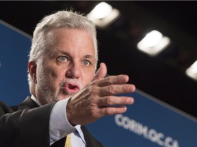 “My friends, we have 312 days,” Premier Philippe Couillard said Friday night. “312 days to again merit the confidence of Quebecers, 312 days to project us into the future with Quebecers. The countdown is on.”