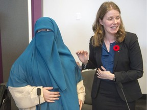 Marie-Michelle Lacoste and lawyer Catherine McKenzie speak to the media Nov. 7, 2017 in Montreal.