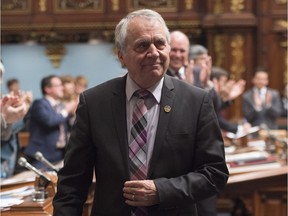 Parti Quebecois MNA Francois Gendron, walks back to his seat at members of the National Assembly pay him a tribute for being an elected member for the last 40 years, Tuesday, November 15, 2016 at the legislature in Quebec City. Gendron was elected in 1976 with the first Parti Quebecois government.