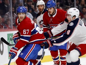 Canadiens winger Max Pacioretty gets shoved by Blue Jackets defenseman Zach Werenski as Canadiens' Andrew Shaw during game last month at the Bell Centre.