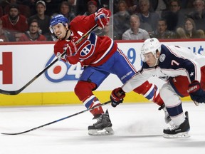 Montreal Canadiens defenceman Shea Weber, taking a shot on net as Columbus Blue Jackets' Jack Johnson tries to block him on Nov. 14, 2017, has returned to Montreal from Vancouver to get treatment for a foot injury.