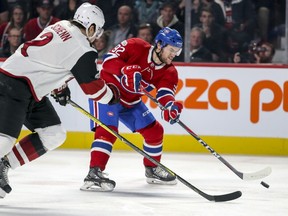 Montreal Canadiens' Jonathan Drouin takes a shot on net past Arizona Coyotes Luke Schenn during first period of National Hockey League game in Montreal on Nov. 16, 2017.