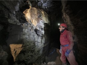 Spelunker Daniel Caron shows some of the rock formations in the the cavern found in St-Léonard in December. Quebec's caves are not nearly as dangerous as those in Thailand, says François Gélinas, executive director of the Société québécoise de spéléologie.