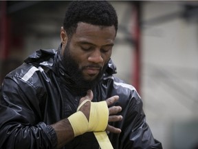 Boxer Jean Pascal applies tape during workout at at Claude Robillard centre on Dec. 4, 2017.