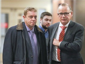 Glen Crossley, left, leaves courtroom with his lawyer, Gilbert Frigon, in Montreal on Tuesday, Dec. 5.