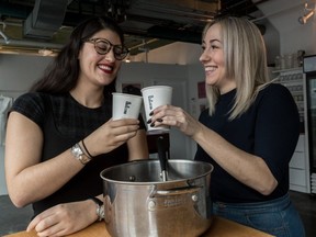 Alyssa Stokvis-Hauer, left, operations and programming manager at the Museum of Jewish Montreal, and Kat Romanow, director of food programming at the museum, prepared mulled Manischewitz at the Museum of Jewish Montreal on Wednesday December 6, 2017.