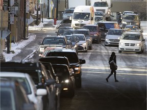 Cars line up on Lucien L'Allier to access Saint-Antoine street as motorists look for alternative routes out of the downtown core in Montreal on Monday December 11, 2017. The closure of the two downtown entrances to the 720 are seeing traffic enter the expressway at a new temporary entrance at Rose-De-Lima. Atwater and Lucien L'Allier have not been converted to two turning lanes to accommodate the huge increase in traffic, causing long waits to make the left turn on Saint-Antoine. (Allen McInnis / MONTREAL GAZETTE) ORG XMIT: 59890
