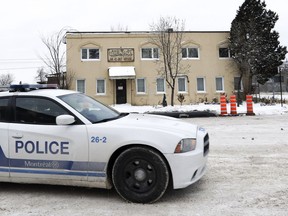 A police car patrols in front of the Ahl-Ill Bait mosque in Montreal Dec. 15, 2017, after the mosque was at the centre of a controversial TVA news report.