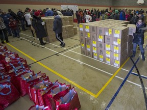 Dozens of volunteers are needed to help West Island Mission deliver Christmas baskets each year.