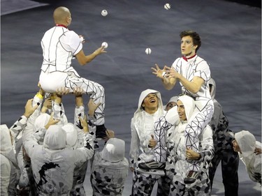 Jugglers toss balls to each other during the debut of Cirque du Soleil's latest production Crystal at the Bell Centre in Montreal Wednesday Dec. 20, 2017.