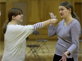 Cicely Austin (left) and Olivia Kearvell-Jobin practice improv at the Red Barn Community Centre in Baie-D'Urfé .