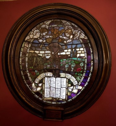 MONTREAL, QUE.: DECEMBER 19, 2017-- A stained glass window in the main staircase pays tribute to members who fell during the first world war at the University Club in Montreal on Tuesday December 19, 2017. The club has decided to sell its landmark building and move members to the St. James club while looking for a new location. All the staff will be let go. (Allen McInnis / MONTREAL GAZETTE) ORG XMIT: 59928