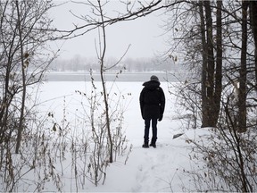 Volunteers search for clues of missing woman Priti Patel in a park along the Rivière-des-Prairies on Saturday, Dec. 23, 2017. (Allen McInnis / MONTREAL GAZETTE)