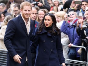 Prince Harry and fiancée Meghan Markle attend the Terrance Higgins Trust World AIDS Day charity fair at Nottingham Contemporary on December 1, 2017 in Nottingham, England.