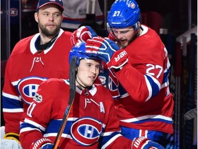 Alex Galchenyuk, right, congratulates Brendan Gallagher for his 100th career goal on Dec. 2. Gallagher has been the Canadiens player most exceeding expectations this season, while Galchenyuk has been a disappointment.