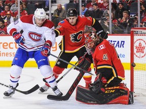 Nicolas Deslauriers #20 of the Montreal Canadiens scores on Mike Smith #41 of the Calgary Flames during an NHL game at Scotiabank Saddledome on December 22, 2017 in Calgary, Alberta, Canada.