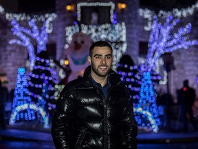 Sami Hajjar, 24, has lit up his family home in Montreal with 100,000 Christmas lights and Frozen characters.