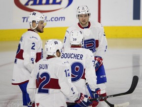 Laval Rocket defenceman Jakub Jerabek, top right, speaks with his teammates as they wait for a face-off against the Lehigh Valley Phantoms during AHL action in Montreal on Friday, Nov. 17, 2017.