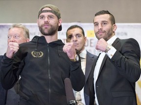 Laval's David Lemieux squares off with Britain's Billy Joe Saunders at their pre-bout news conference in Laval on Thursday.