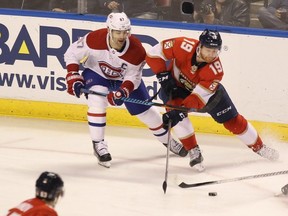 Panthers' Mike Matheson moves the puck against Canadiens' Max Pacioretty on Saturday, Dec. 30, 2017, in Sunrise, Fla. "Obviously, with the C on my sweater I know I take a huge responsibility … the most responsibility for what’s going on right now," said Pacioretty, who hasn't scored in a month. "I take that personally and I’m just going to keep working to try and help my teammates and myself get through this."