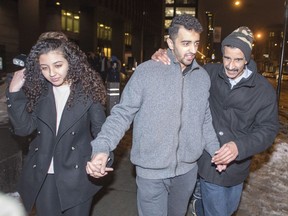 Sabrine Djermane, left to right, El Mahdi Jamali and his father leave the courthouse after the pair were acquitted of terror-related charges on Tuesday.