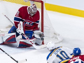 Canadiens goalie Carey Price stops a shot from Blues' Brayden Schenn during first period Tuesday night. Schenn would go on to score a hat trick in Blues' 4-3 win.
