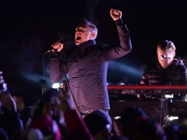 Bryan Adams plays during the second intermission at the NHL 100 Classic  in Ottawa on Saturday, Dec. 16, 2017.