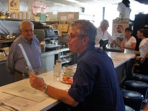 Anthony Bourdain at Beauty's with owner Hymie Sckolnick.