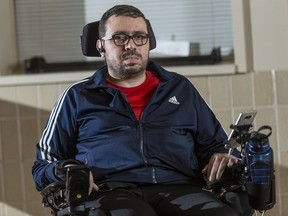 Aymen Derbali poses for a photo in Quebec City on Wednesday, December 27, 2017. A fundraiser to find a new home for a man who lost use of his legs in the Quebec City mosque shooting earlier this year has reached almost half its goal. Aymen Derbali, a father of three, was one of the more than 50 people inside the mosque when a shooter opened fire last Jan. 29, killing six. He took seven bullets and was paralyzed from the waist down. The objective is to raise the $400,000 before the first anniversary of the shooting. THE CANADIAN PRESS/Francis Vachon