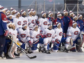 The Canadiens pose for a team photo after an outdoor practice at Lansdowne Park in Ottawa on Friday, Dec. 15, 2017, ahead of the NHL 100 Classic outdoor game the next day.