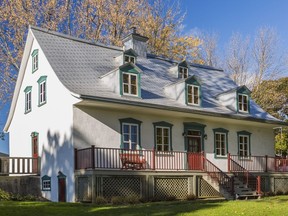 Maison Pageot-Magnan, which was built in the French-inspired architectural style of the early 19th-century, has a pitched roof and eaves extending on the front and back.