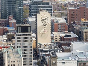 Leonard Cohen looms over downtown Montreal. The late singer was honoured with multiple murals in 2017.