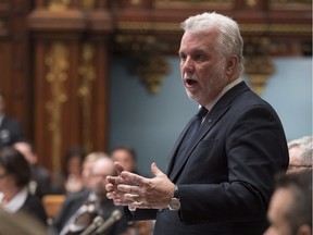 Premier Philippe Couillard described as "ridiculous" the Parti Québécois motion encouraging workers to stop greeting customers with “Bonjour-Hi.” But Liberals, including anglophone MNAs, all voted in favour nonetheless.