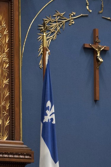 Quebec legislature Speaker Jacques Chagnon speaks before question period, Wednesday, September 18, 2013 at the legislature in Quebec City. A proposed Quebec charter of values would allow the crucifix inside the legislature but would ban all religious signs in government buildings. THE CANADIAN PRESS/Jacques Boissinot