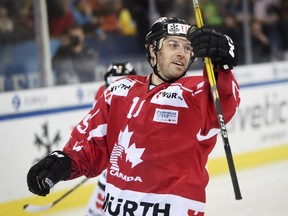 Canada's Andrew Ebbett celebrates after scoring his side's second goal during the game between Team Canada and HC Davos at the 91st Spengler Cup ice hockey tournament in Davos, Switzerland, Thursday, Dec. 28, 2017.