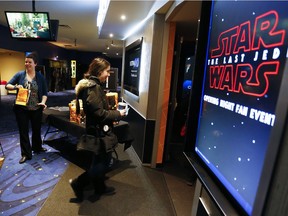 People get ready to watch the first screening of Star Wars: The Last Jedi movie on Thursday December 14, 2017 at Galaxy Cinemas Peterborough in Peterborough, Ont. CLIFFORD SKARSTEDT