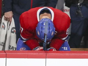 Canadiens captain Max Pacioretty hangs his head on the bench during third period of a 4-1 loss to the Sharks on Tuesday night at the Bell Centre.